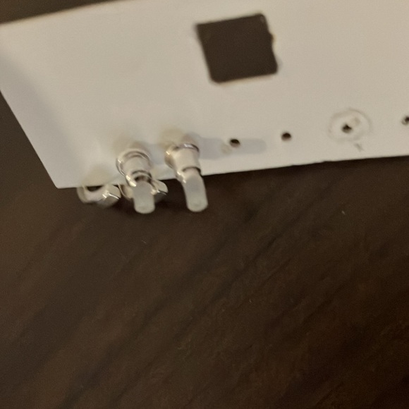 Silver circle earrings with faux diamond accents and faux Ruby. - Picture 3 of 4